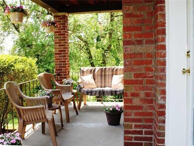 Exterior Front. This quaint side porch is perfect 