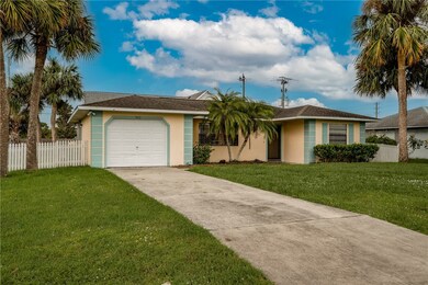 Driveway with side entrance to fence