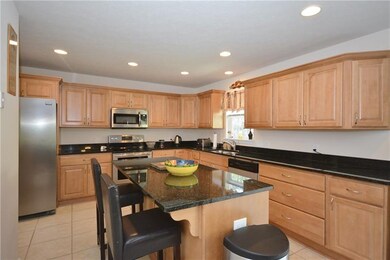 Large Kitchen with custom cabinets, stainless appl