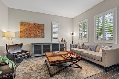 Living area featuring wood finished floors and bas