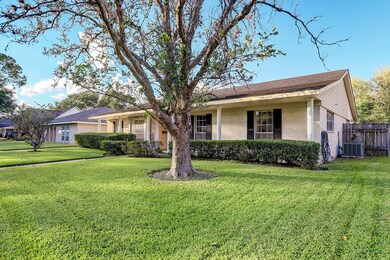 The curb appeal is outstanding with a large Maple