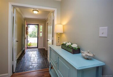 Greet your friends in a beautiful bluestone foyer 