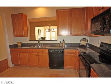 Kitchen - Kitchen with ceramic tile floor, maple c