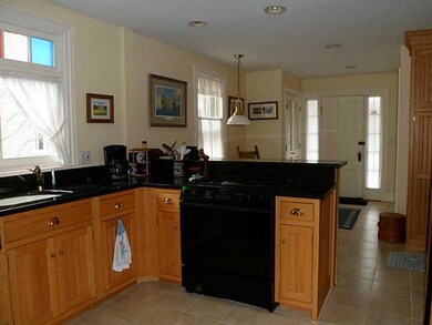 Kitchen. Roomy kitchen has oak...