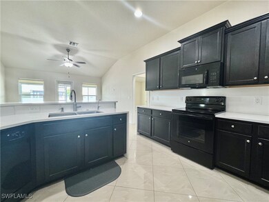2103 NE 4th Place, Cape Coral, FL 33909 - photo 6