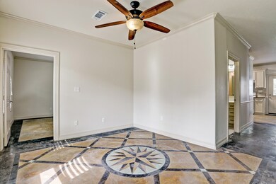 Another view of the entry way and hall leading to the kitchen/dining room
