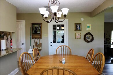 Breakfast nook to door to garage