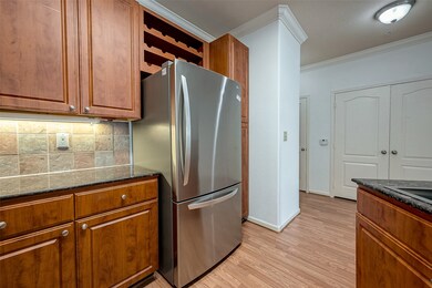 The 11x11 kitchen also features recent stainless L