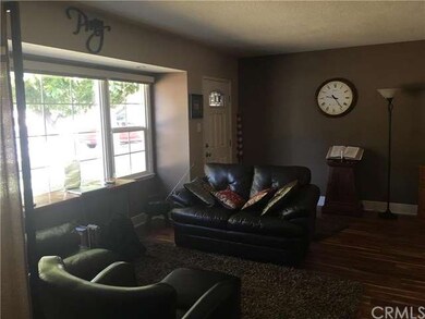 View# 2 of living room. You'll get a sun room like