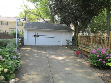 Garage along with rear deck over looking back yard