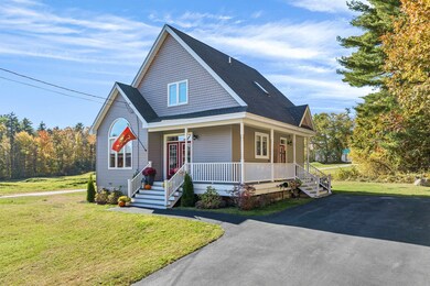 109 Tuftonboro Neck Rd, Mirror Lake, NH 03853 - photo 3