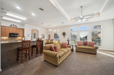 Living area- open to kitchen with recessed lightin