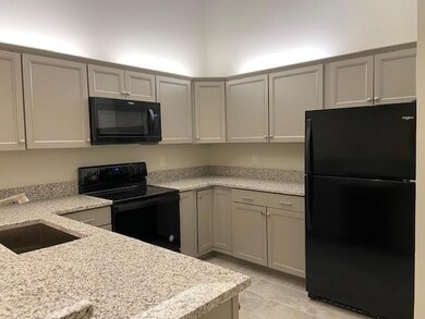 4393 Woodstock Dr unit A, West Palm Beach, FL 33409 - photo 3