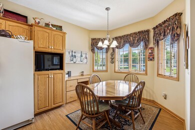 This informal dining room right off the kitchen is ideal for those meals in. Spacious room features a built in desk for more storage and counter space if needed.