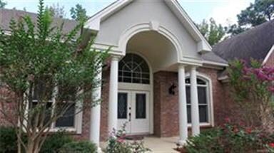 Inviting entry with colorful landscaping!