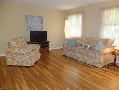 Living room with white oak flooring.