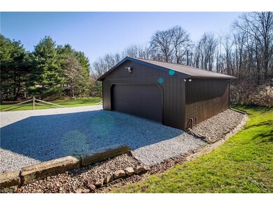 2 CAR GARAGE, AUTOMATIC DOOR OPENER, CONCRETE FLOO