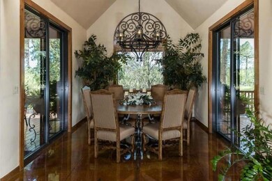 dining room w/ covered deck each side