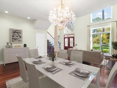 2 story entry opens to Living and Dining. Virtually Staged.