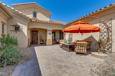 Huge paver and gated courtyard to entry