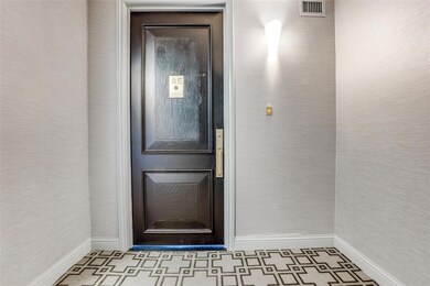 Front door for unit 8E located on the 8th floor.