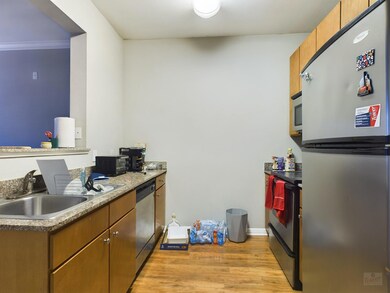 Kitchen with stainless steel appliances, a sink, 