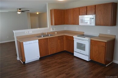Open kitchen floorplan with dining area and view o