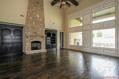 The family room opens to the kitchen and offers 4