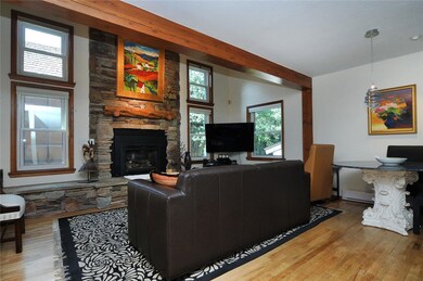 Living room with furnace rated fireplace, vaulted