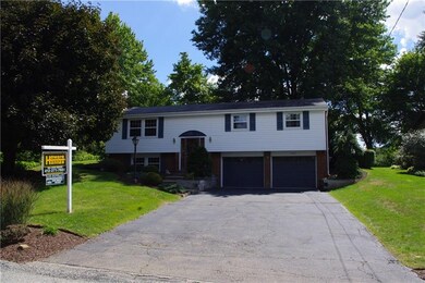 This home features three bedrooms, formal living r