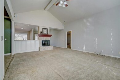 Living room looking towards kitchen and formal din
