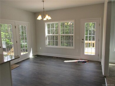 Dining Area with French Doors leading out to the l