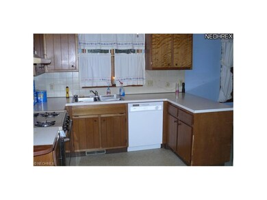 Kitchen - to the right kitchen opens up to family 