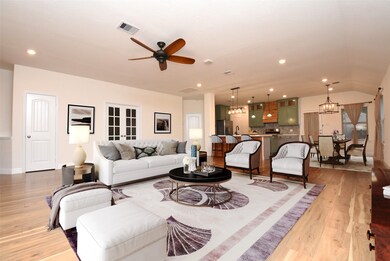 This is a digitally staged picture that gives you an idea of the size fo the large room and the possibilities of putting furniture in different areas. What a great, open, bright room to entertain and just enjoy life.
