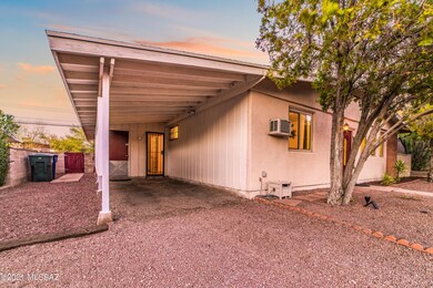 Carport w/storage closet and side gate