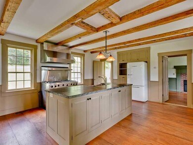 Kitchen. Modern touches include a...