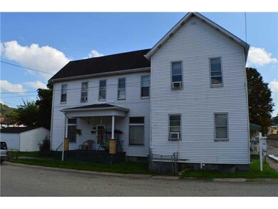 Exterior Front. Entrance to two story rear unit
