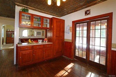 the french door lead to the south facing sun-room