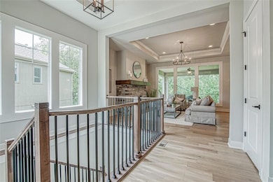 True entry with stunning hardwoods and coat closet