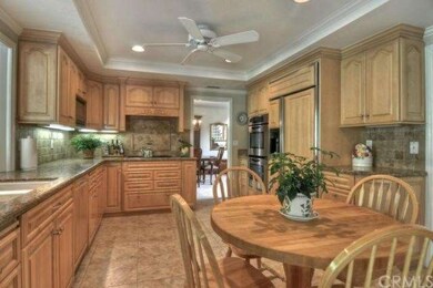 Granite counters and tumbled stone backsplash, bui