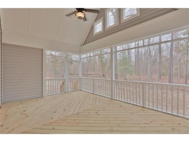 Screen porch off family room mimics ceiling of fam