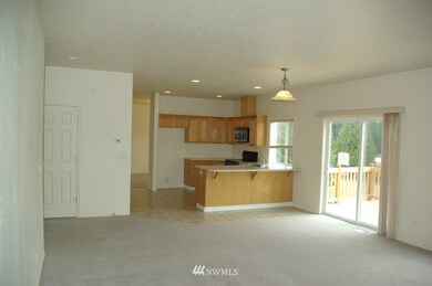 View from the family room looking into the kitchen. 
