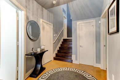 Foyer. Two bedrooms downstairs that share a full b