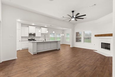 Experience seamless living with a spacious open fl