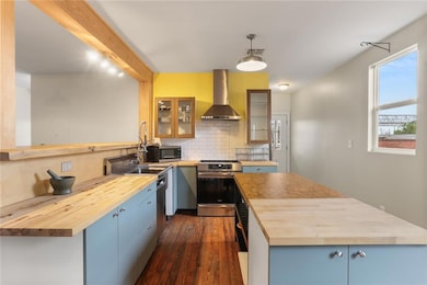 Updated kitchen with butcher block countertops and