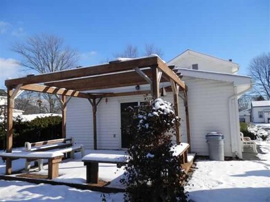 Exterior Back back of house with arbor