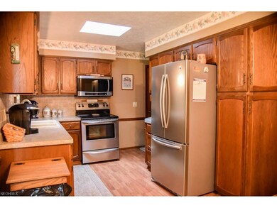 Kitchen has stainless steel appliances.
