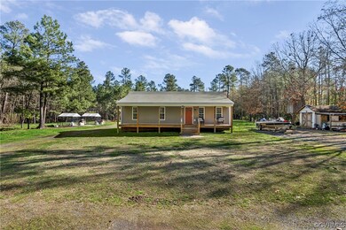 View of front of house featuring a front lawn