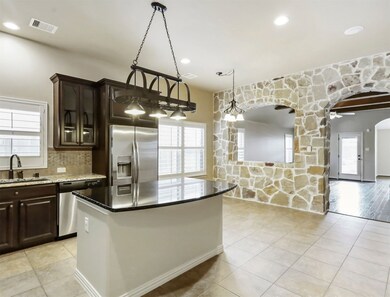 Beautiful kitchen featuring granite countertops