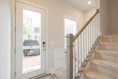 Foyer entrance featuring stairway